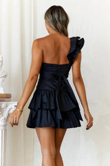 Black ruffled dress, a sweet yet edgy little black dress that flatters the figure